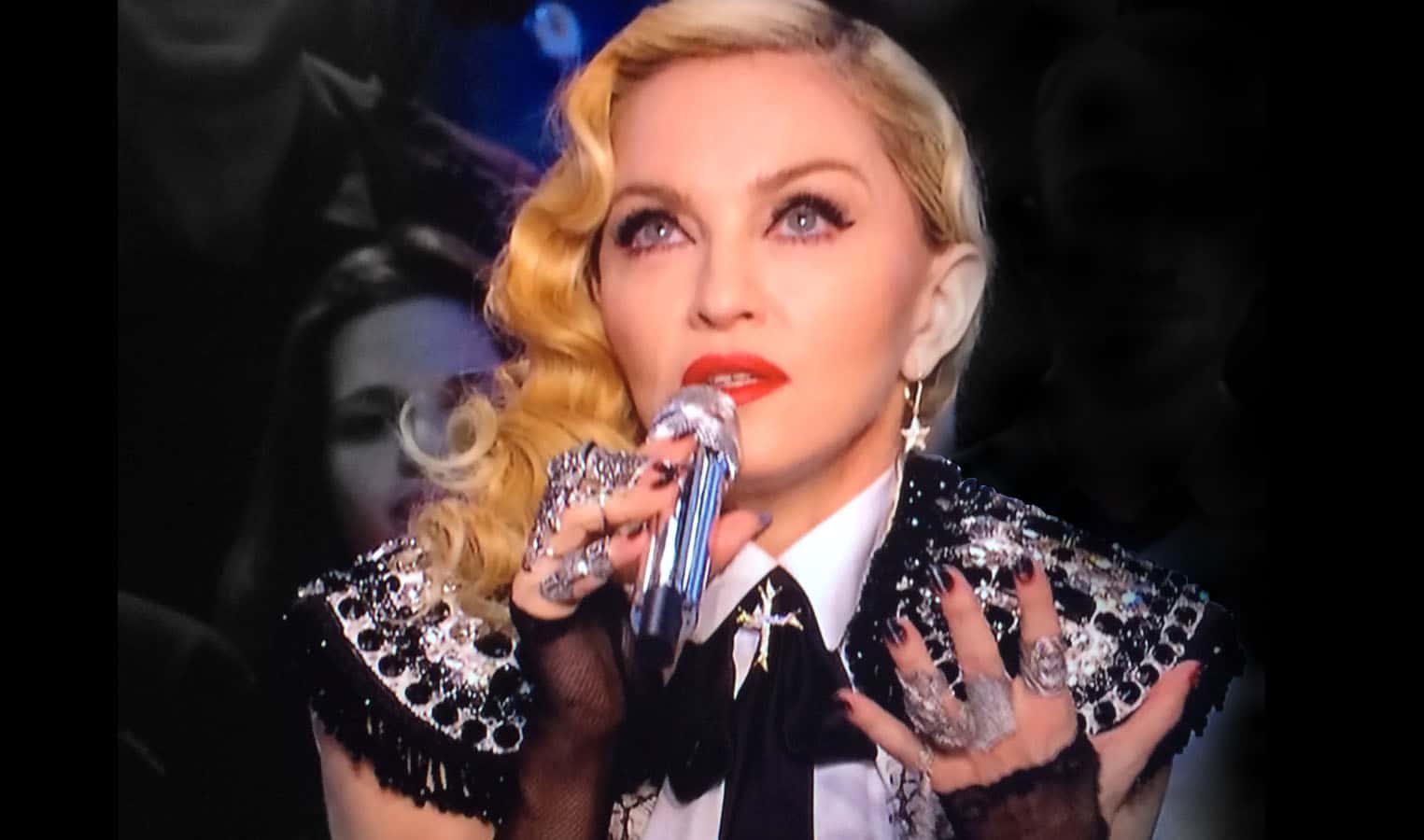 Madonna wearing ON AURA TOUT VU HAUTE COUTUTRE BOLERO LACE CRISTAL