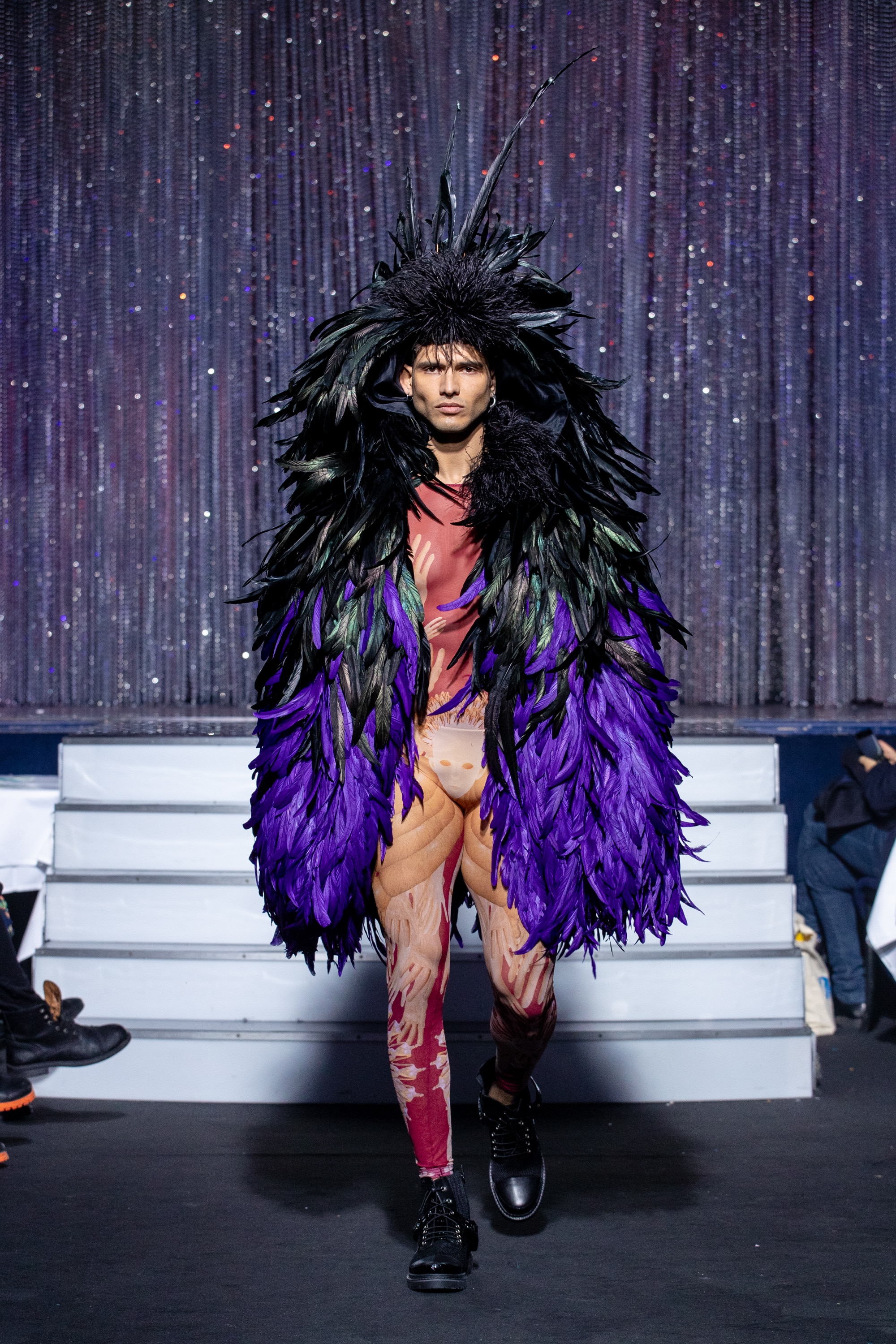 a men model wearing  purpple feathers outfit  crystal   by on aura tout vu haute couture spring summer 2020
