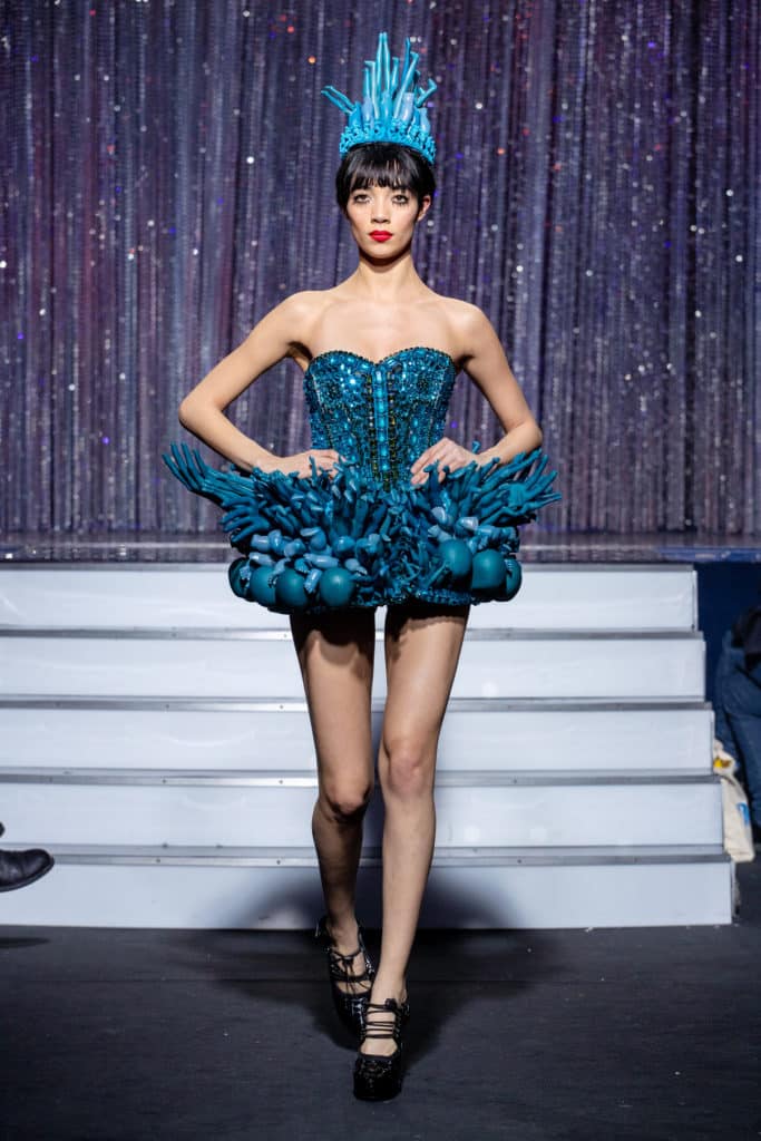 a model wearing  bleucrystal corset and dolls outfit  by on aura tout vu haute couture spring summer 2020