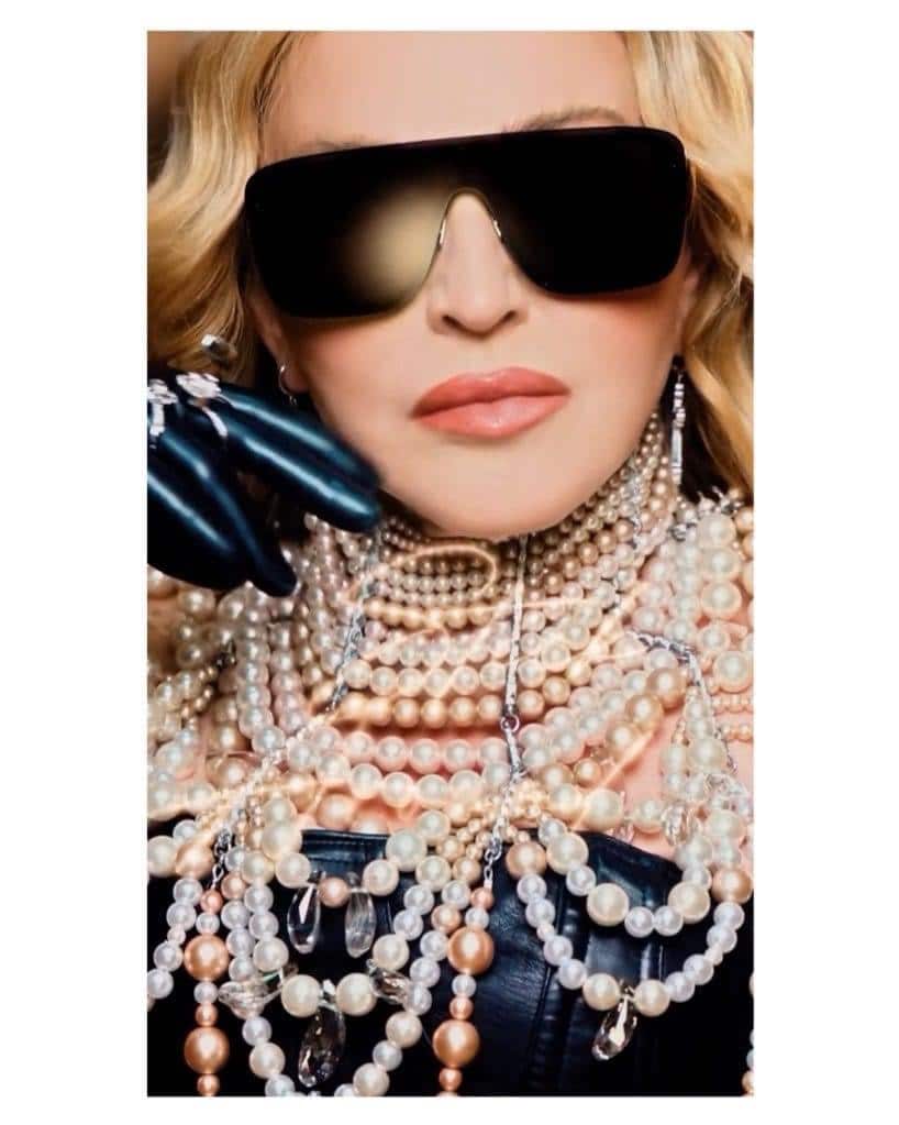Madonna wearing On Aura Tout Vu couture pearls necklace 