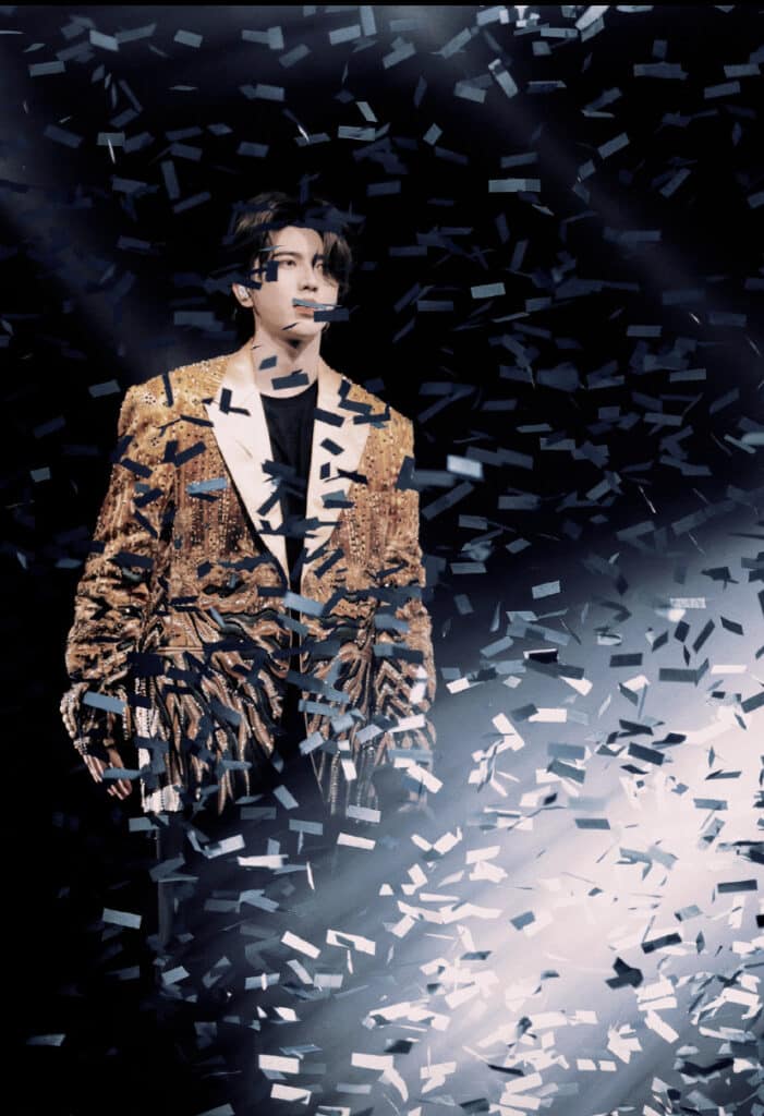 kun is wearing haute couture jacket by on aura tout vu 